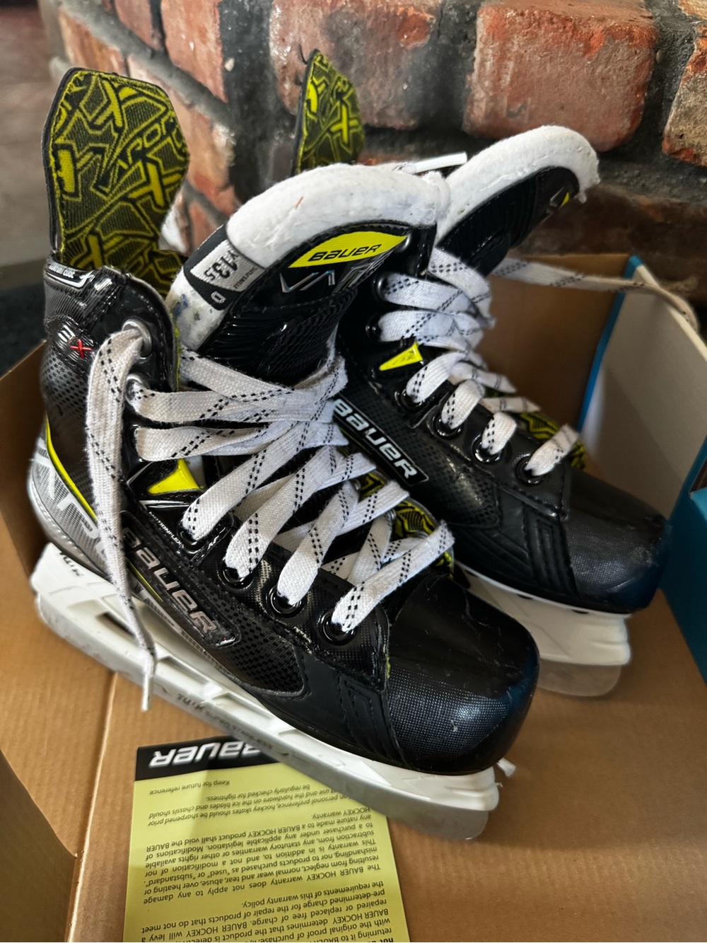 Bauer Kids Black and Yellow Ice Hockey Skates